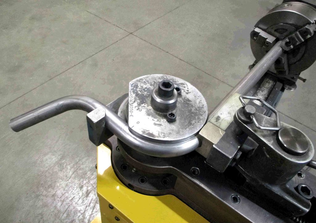 A tube being formed in a rotary draw bender