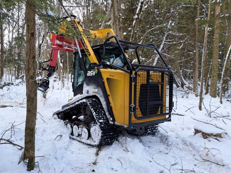 ASV trac loader with brush guard